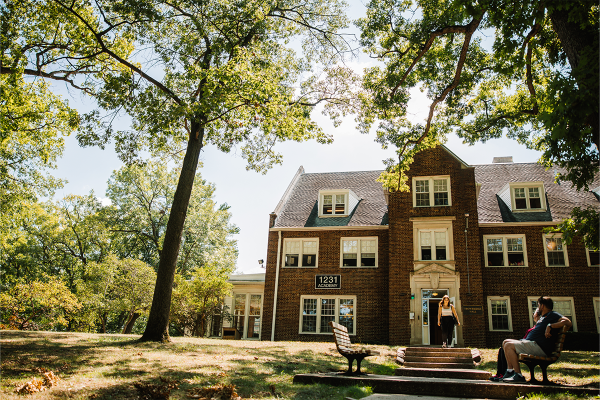 Kalamazoo College dorm with blooming trees in spring