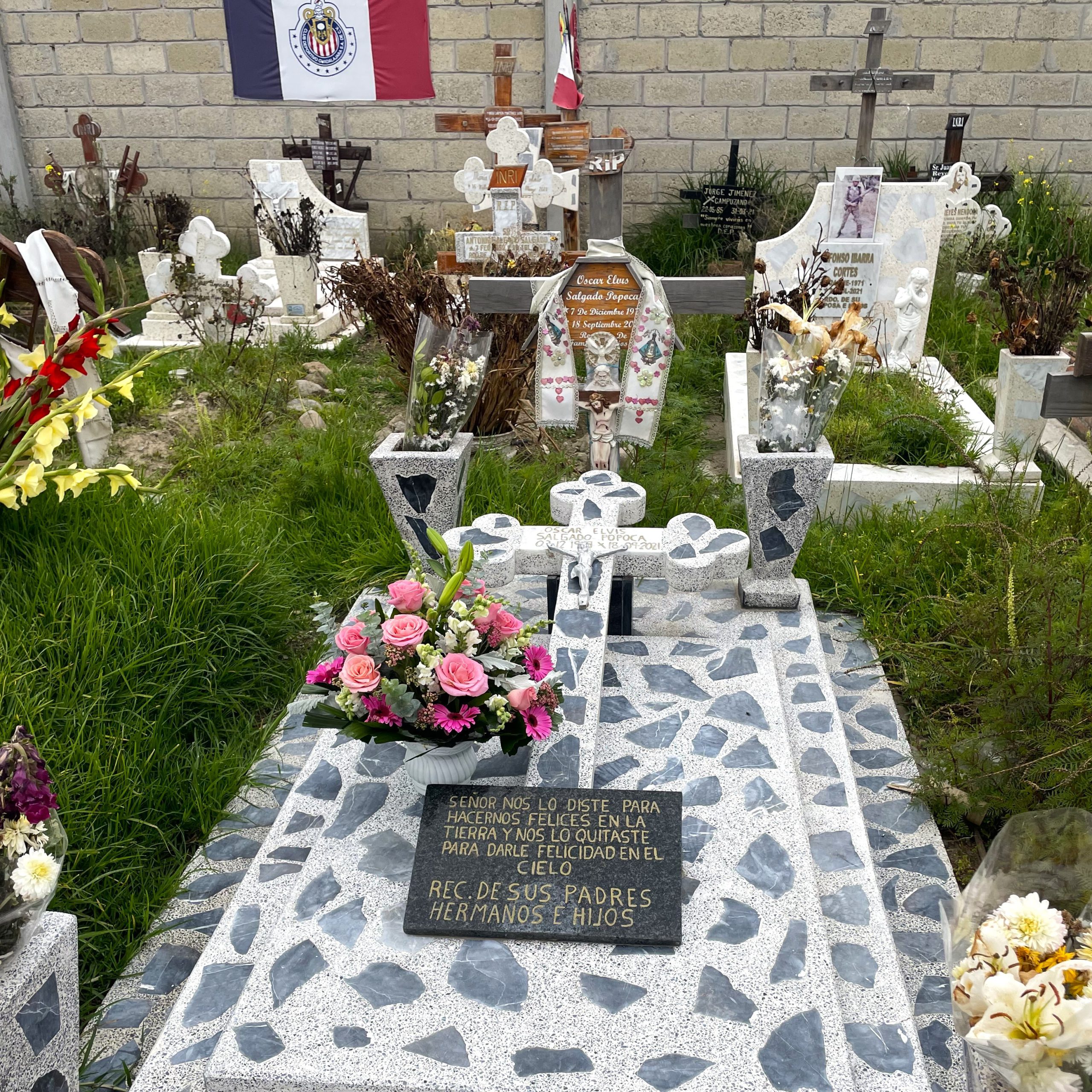Mexico cemetery with adorned gravesites